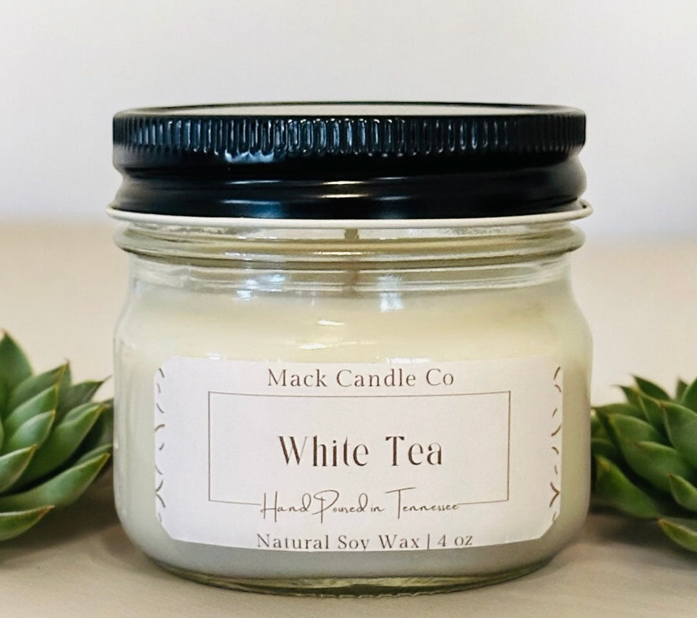 Luxury White Tea Soy Candle, comes in a small Mason jar filling the space of a small room or kitchen. Non toxic clean burning handpoured in small batches in Nashville Tennessee. 